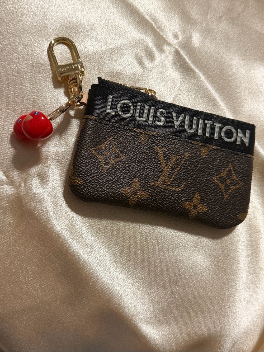Louis Vuitton Brown Monogram Coin Pouch with Red Charm